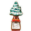 Festive Christmas tree with a red base is the centerpiece of the holiday decor