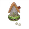 Rustic birdhouse with realistic bird and eggs, adding a touch of nature to your garden