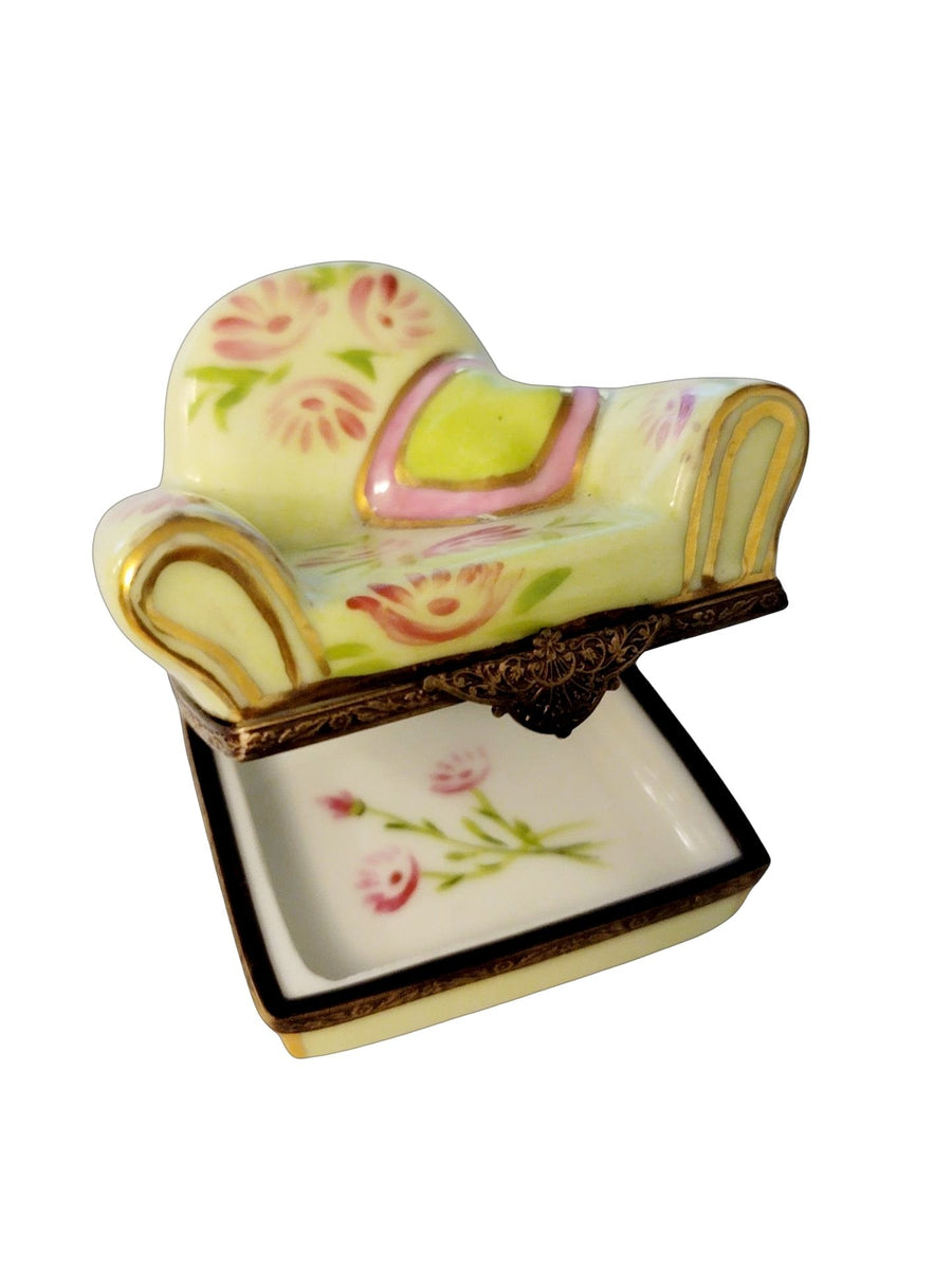 Flowered chair with white and pink floral pattern in spacious living room 