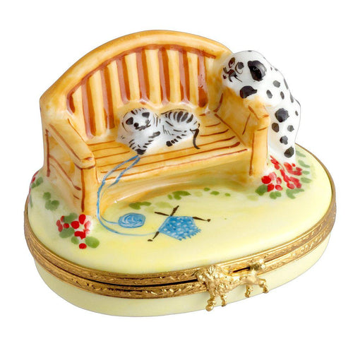 Outdoor garden bench featuring a playful dalmation dog and cat design