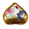Exquisite and beautiful heart-shaped butterfly figurine displayed on a shimmering gold stand
