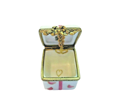 Lovely heart-shaped gift box with dangling heart decoration