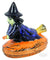 A mystical and enchanting depiction of a witch riding a broom