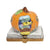 Peter Peter Pumpkin Eater toy with orange pumpkin-shaped body and green stem handle