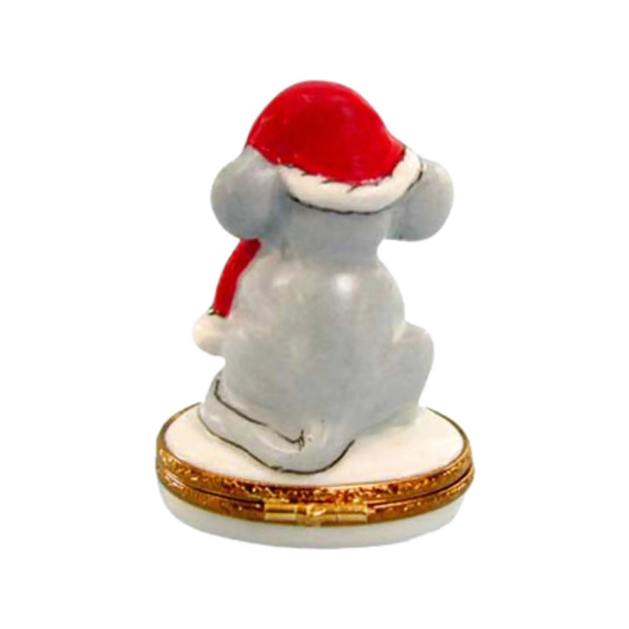 Merry Christmas Mouse holding a candy cane and wearing a Santa hat, surrounded by twinkling lights and festive decorations