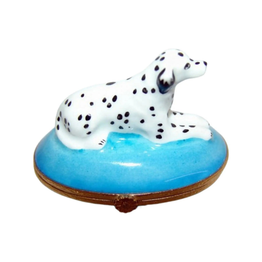 Artoria dog figurine featuring a white Dalmatian with black spots on a blue base
