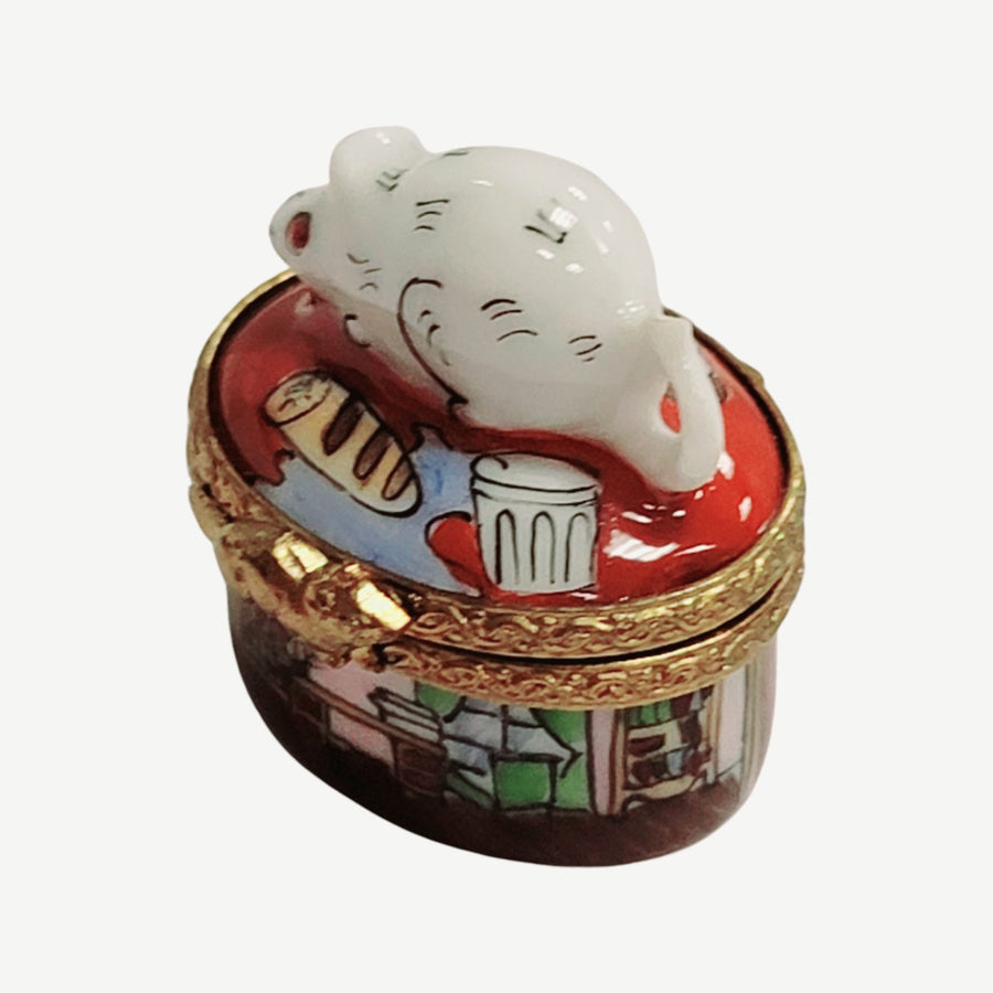 A cute and colorful mini mouse toy peeking out of a tiny house