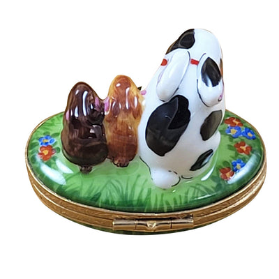 Cute bunny rabbit family surrounded by vibrant spring blossoms in a meadow