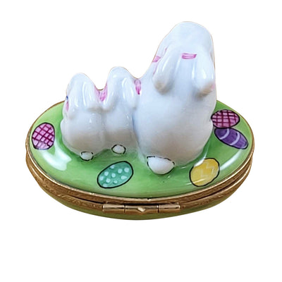 Mother easter bunny with her little bunnies in a peaceful garden