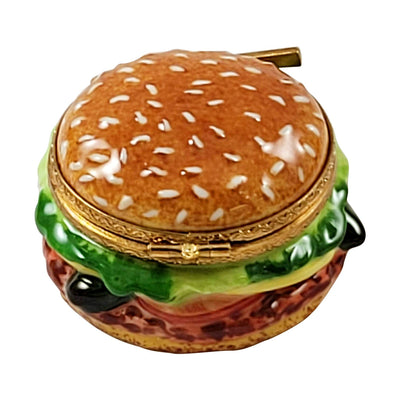 Savory hamburger with fresh vegetables, juicy beef patty, and melted cheese