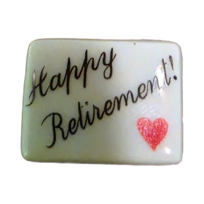 Happy Retirement! porcelain goodie trinket, rectangle shape, 5/8 inch wide, with a red heart
