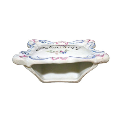 Bottom view of the No Smoking Limoges plaque showing its hollow stand