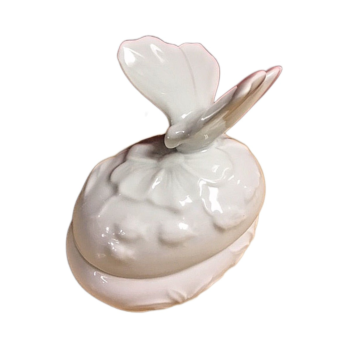 Side view of the butterfly Limoges box, white porcelain with a lift-off lid