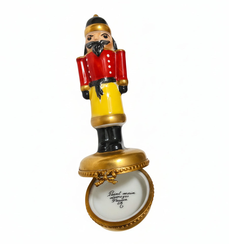 Yellow Nutcracker on Gold