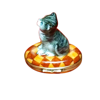 Small Cat with Yellow Collar on Rug Limoges Box