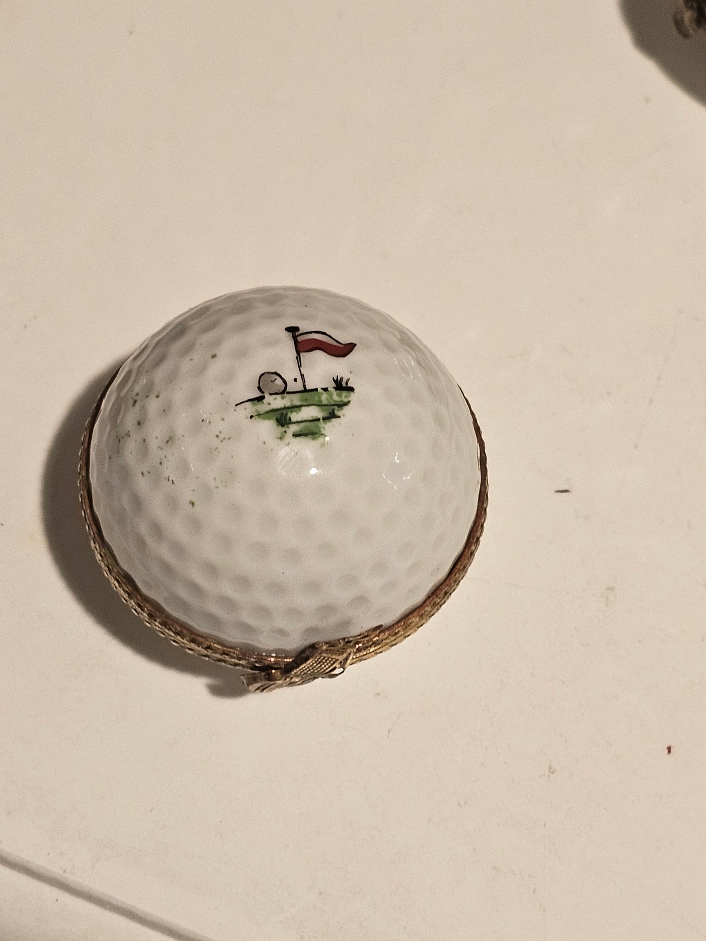 White Golf Ball with Hole Flag Inside