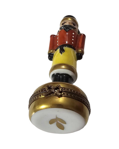 Yellow Nutcracker on Gold