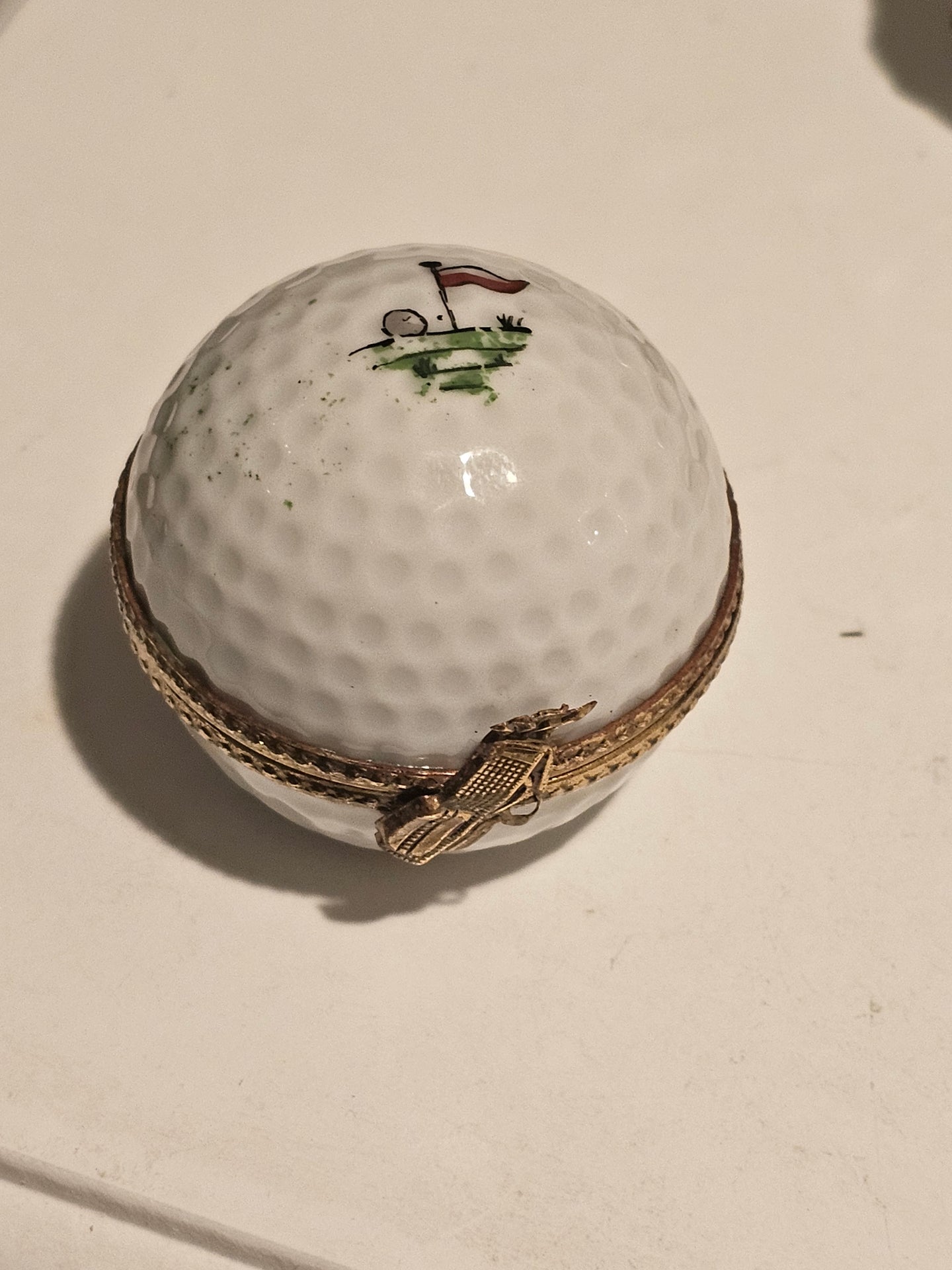White Golf Ball with Hole Flag Inside
