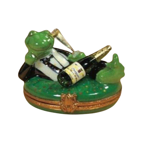 A cheerful and stylish Tuxedo Frog celebrates the New Year with a glass of bubbly champagne