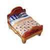 Stylish and comfortable queen-sized bed with upholstered headboard and wooden frame