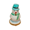 A smiling snowman with a blue hat and scarf standing in the snow