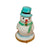 A smiling snowman with a blue hat and scarf standing in the snow