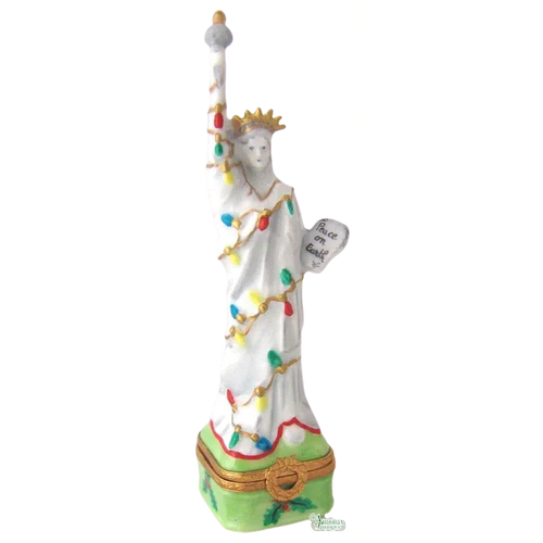 Statue of Liberty Christmas ornament with glittering lights and festive decorations