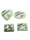 Colorful heart-shaped candies in a transparent box with 'Happy VALENTINE - Goodie' written on it, perfect for Valentine's Day gifting and celebrations