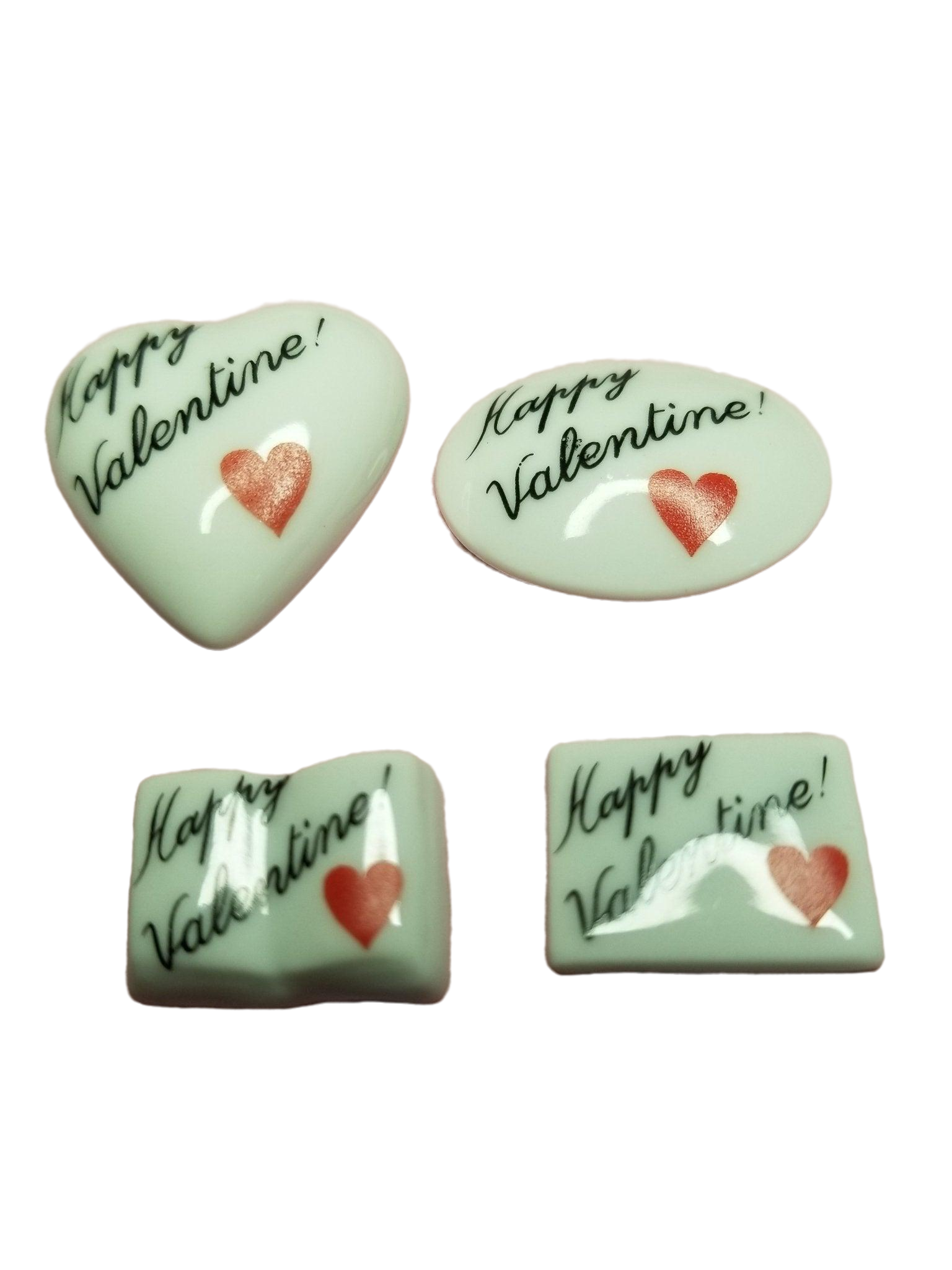 Colorful heart-shaped candies in a transparent box with 'Happy VALENTINE - Goodie' written on it, perfect for Valentine's Day gifting and celebrations