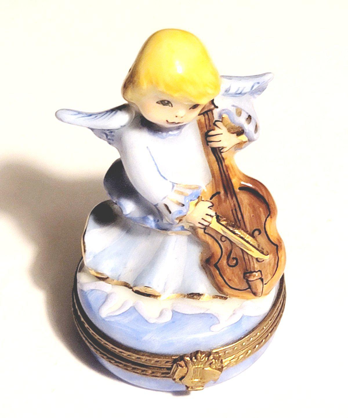 Angel playing a rare and gorgeous 375 cello figurine in exquisite detail