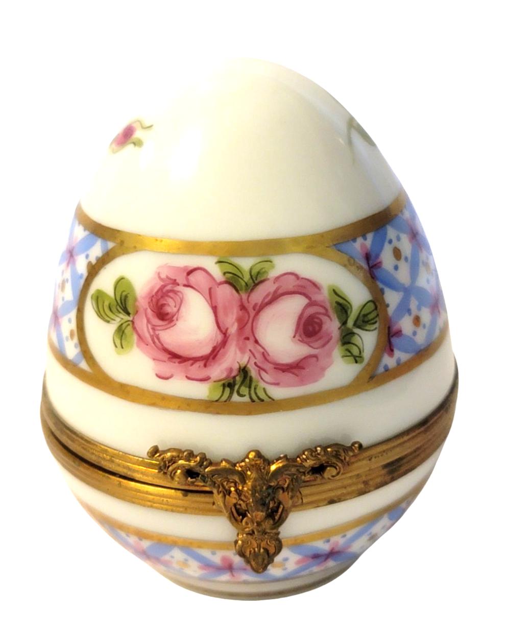 Vintage Easter egg in stunning blue with intricate rose and flower design