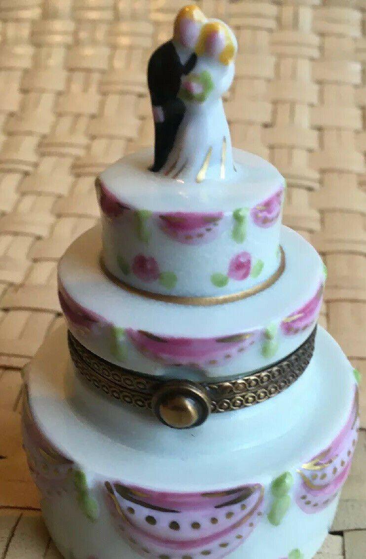 Bride And Groom White Pink Wedding Cake