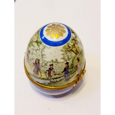 Children Playing At Park in Paris Blue Limoges Porcelain Egg w Unicycle Trinket Box - Limoges Box Boutique