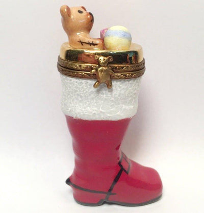 Red Christmas boot stocking with adorable teddy bear and gifts