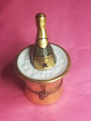 Luxurious gold champagne bucket with ice for chilling drinks