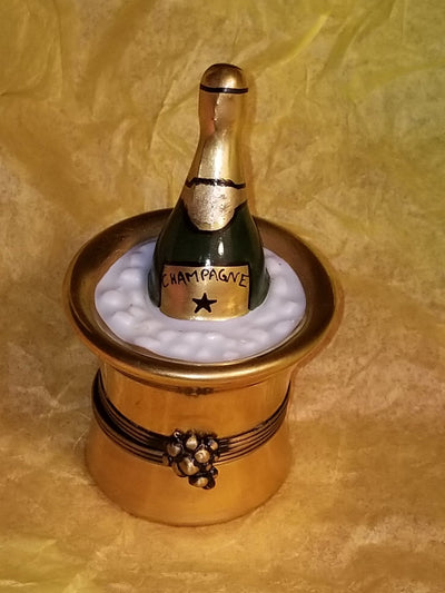 High-quality Limoges gold champagne bucket on ice for chilling