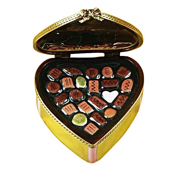 Gold heart and pink bow porcelain chocolates in a decorative box 