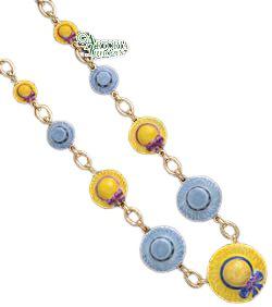 Beautiful yellow and gray hat necklace with intricate detailing and adjustable chain