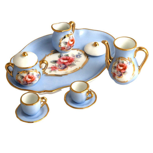 A beautiful, handcrafted blue ceramic mini teaset, perfect for elegant tea parties