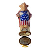 Patriotic Ms Mama Pig standing in front of the United States flag with a patriotic hat