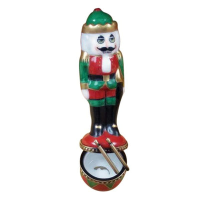 Traditional-wooden-nutcracker-soldier-on-red-and-green-drum