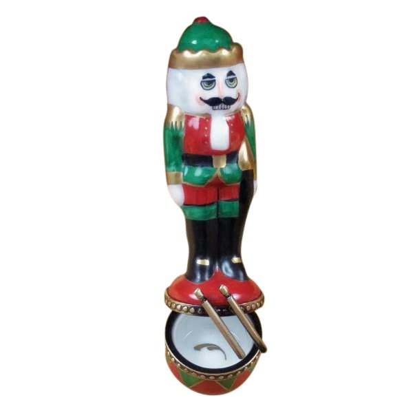 Nutcracker-on-red-and-green-drum-ornament-decorative-christmas-holiday 