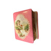 A beautiful pink book with a French theme on a cozy riverside