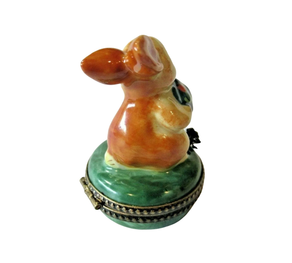 Whimsical garden ornament featuring a rabbit and water can