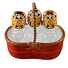 Large-red-basket-handmade-with-three-glass-bottles-containing-red-liquid