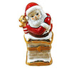 Santa-on-Chimney-decoration-in-white-and-red-attire-with-a-sack-of-gifts