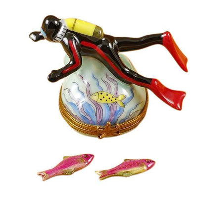 Scuba diver exploring the ocean with two lifelike removable fish