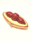 Delicious strawberry tartlet with fresh strawberries on top