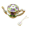 Teapot with elegant butterfly design