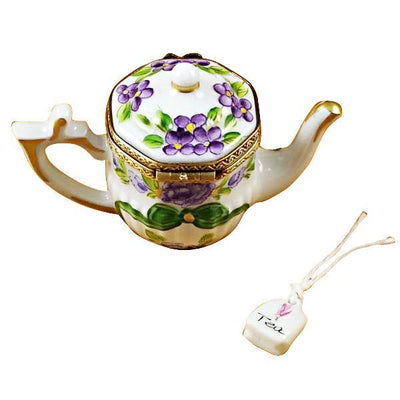 Classic teapot featuring colorful butterfly illustration